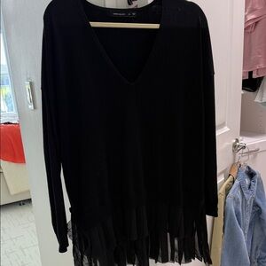 Black V-Neck Sweater with a very stylish hem